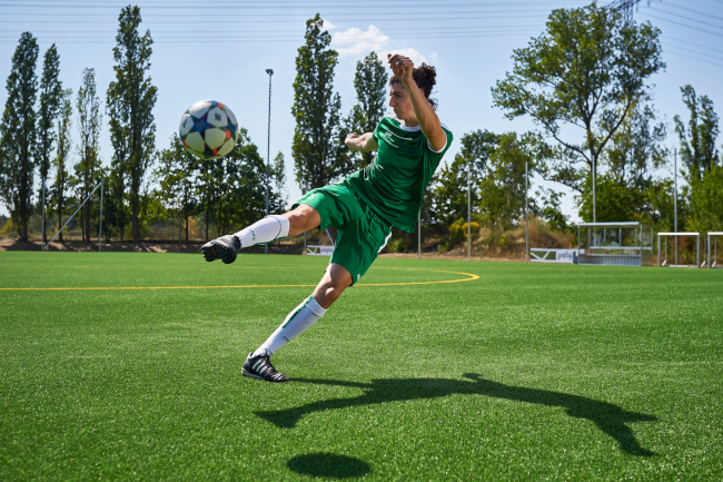 Polytan_football player on field_Sandra Schuck.jpg
