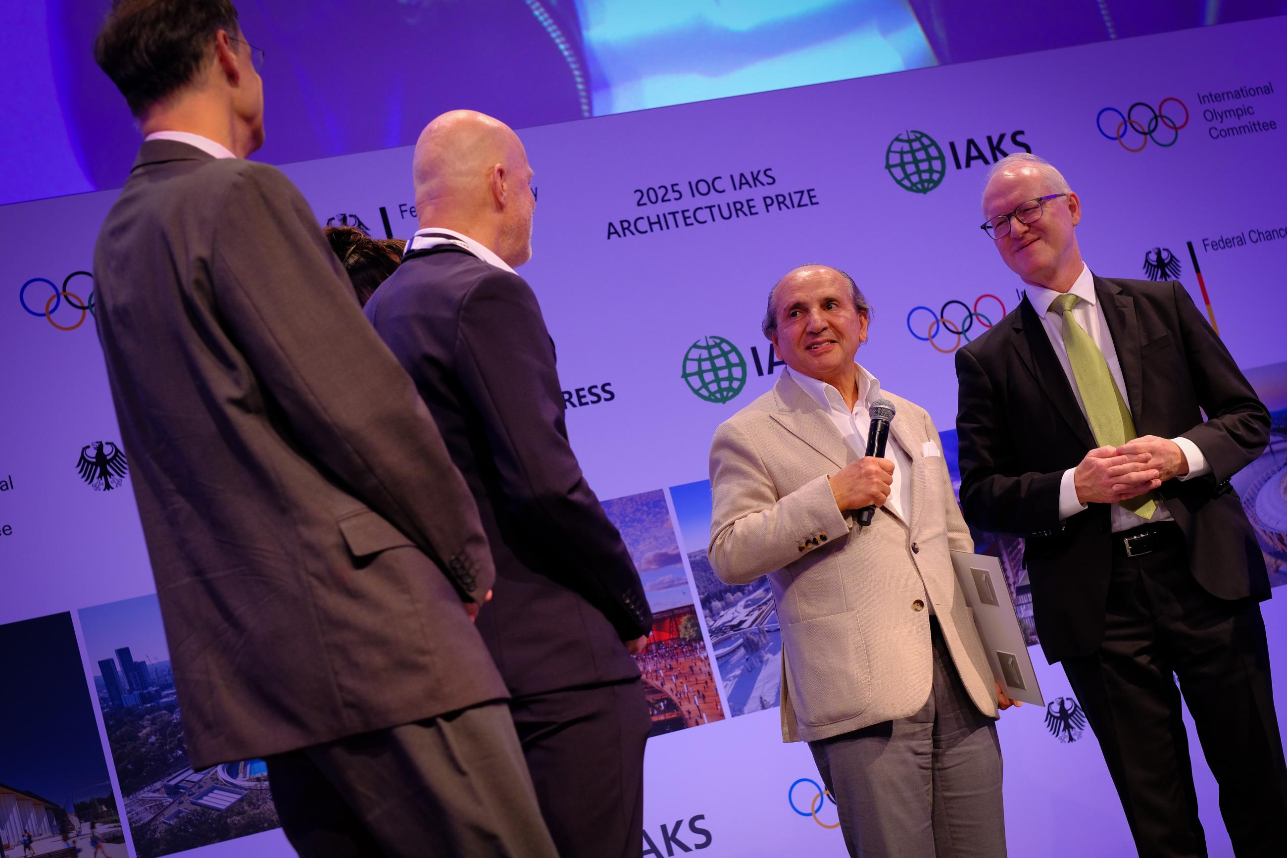 Architect Hadi Teherani receiving the 2025 IOC IAKS Architecture Prize