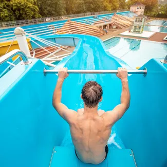 Man on a waterslide