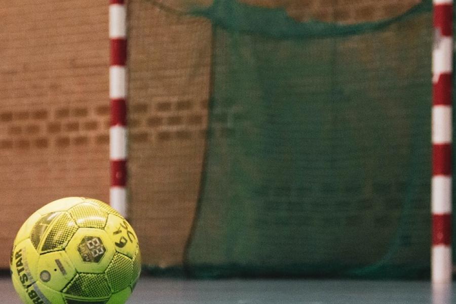 yellow and black soccer ball on field-otuM-nw-_NY-unsplash  pascal-swier 650.jpg