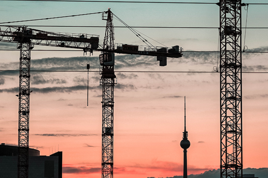 cranes over berlin sky